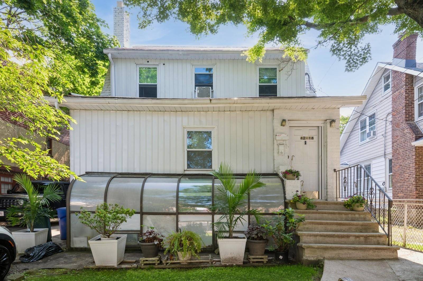 This detached 4 family three story property are a combination of two properties 42 18 20 216th Street in the heart of Bayside offers classic charm with elegant architectural details ...