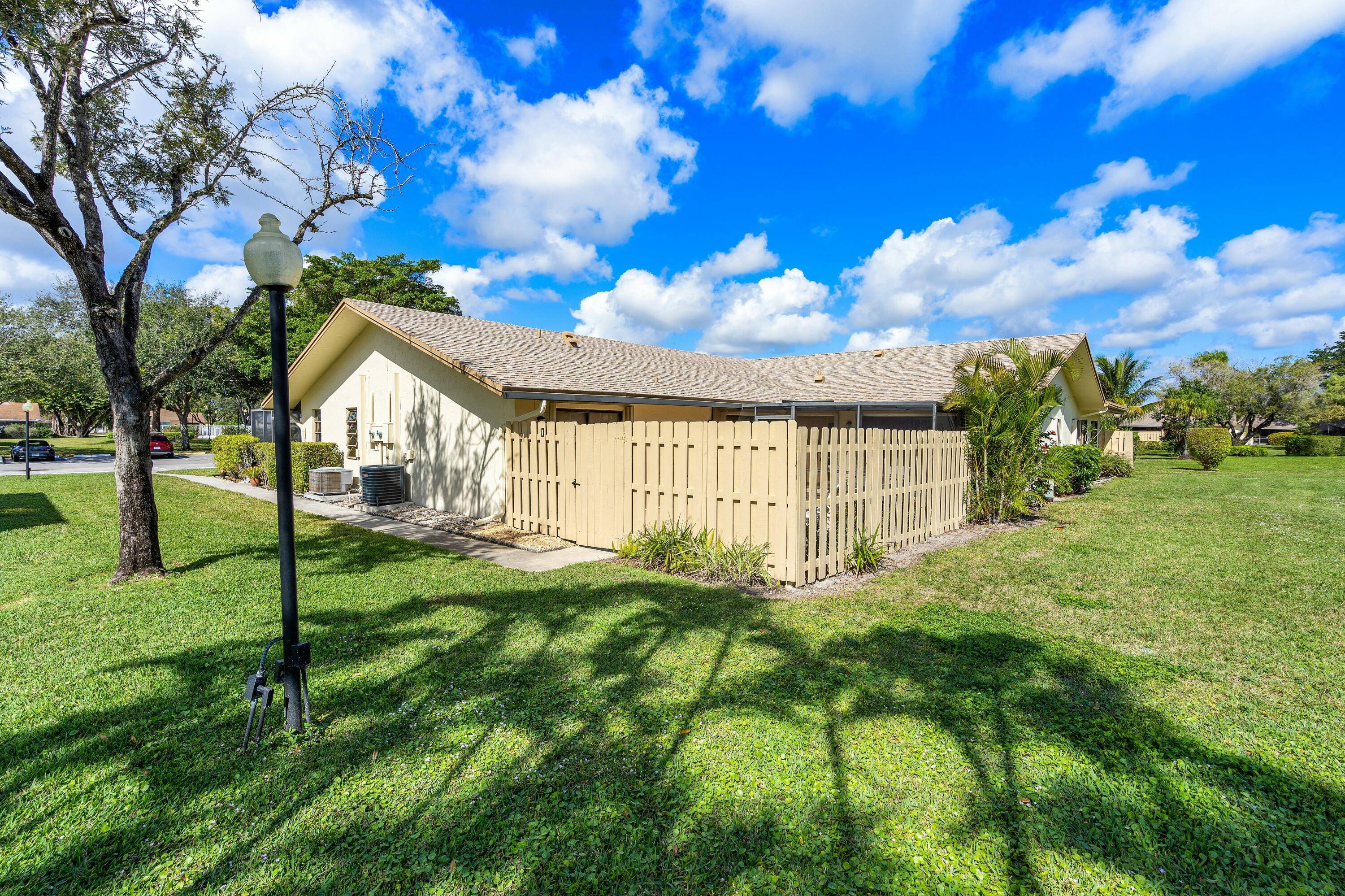 Beautiful modern garden villa located in the highly desirable Rainberry Bay.
