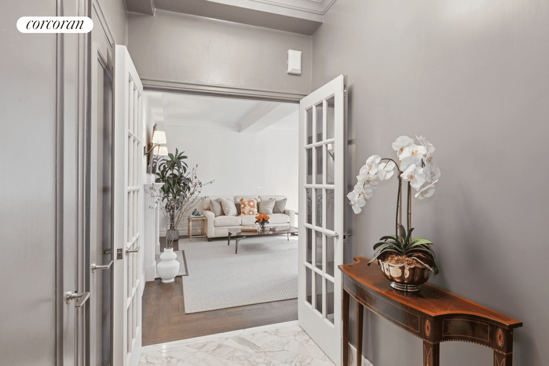 Sunny, pristine, spacious, Classic Six at elegant 55 East 72nd Street, between Park and Madison Avenues.