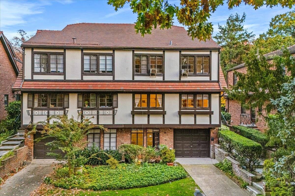 Nestled in the prestigious Forest Hills Gardens neighborhood, this beautifully maintained 4 bedrooms, 2 full baths and 2 half baths semi attached brick home offers a perfect blend of privacy, ...