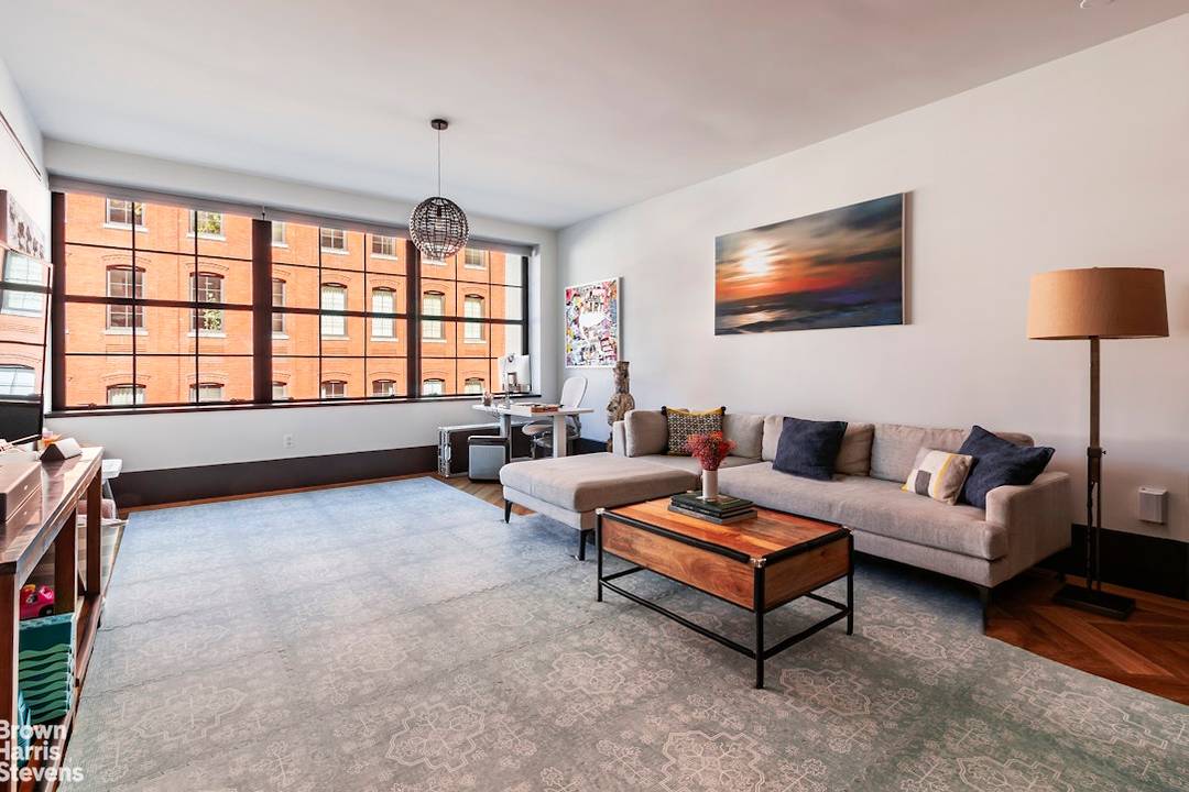 Simply exceptional. This expansive 1, 382 square foot loft offers 2 bedrooms and 2.