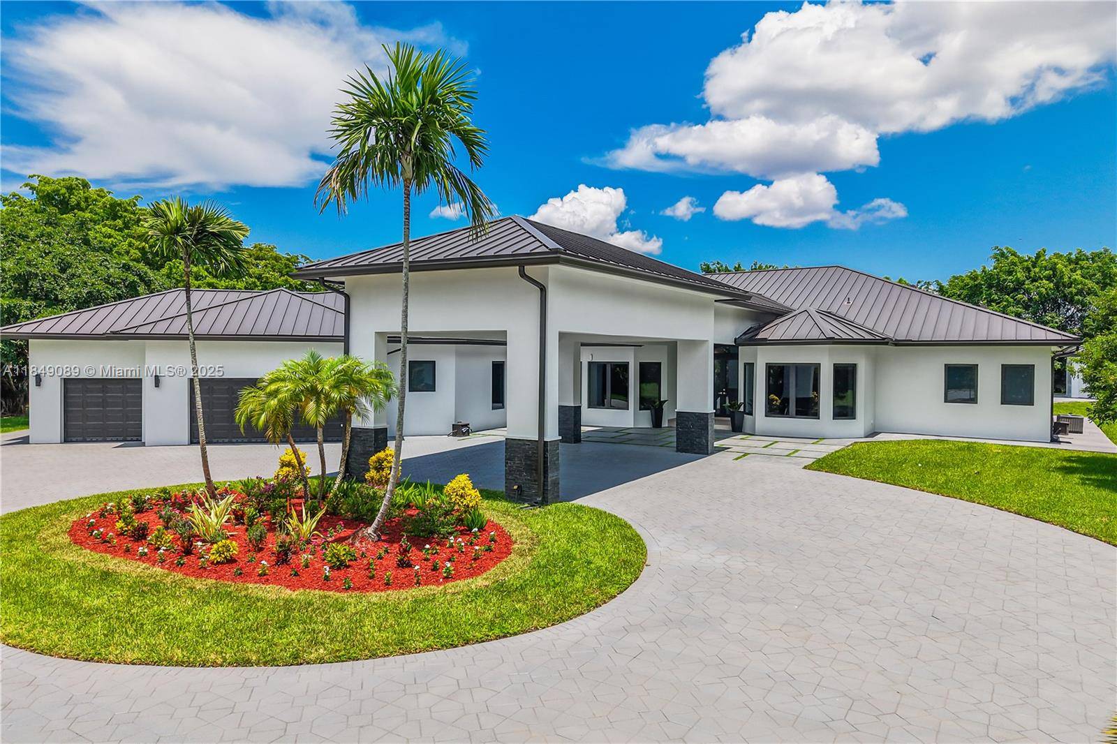 Welcome to this spectacular estate in prestigious Saddle Club Estates an exclusive 2.