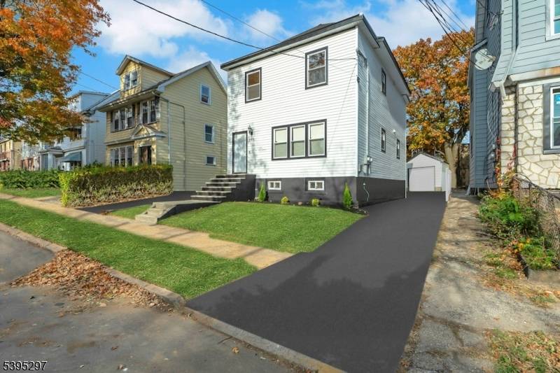 Welcome to this beautifully renovated two family home located in Newark's vibrant South Ward.