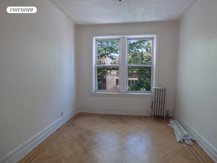 Amazing opportunity ! Large Legal Three Family brick home in Prime Gravesend on Ave U and East 1st Street.