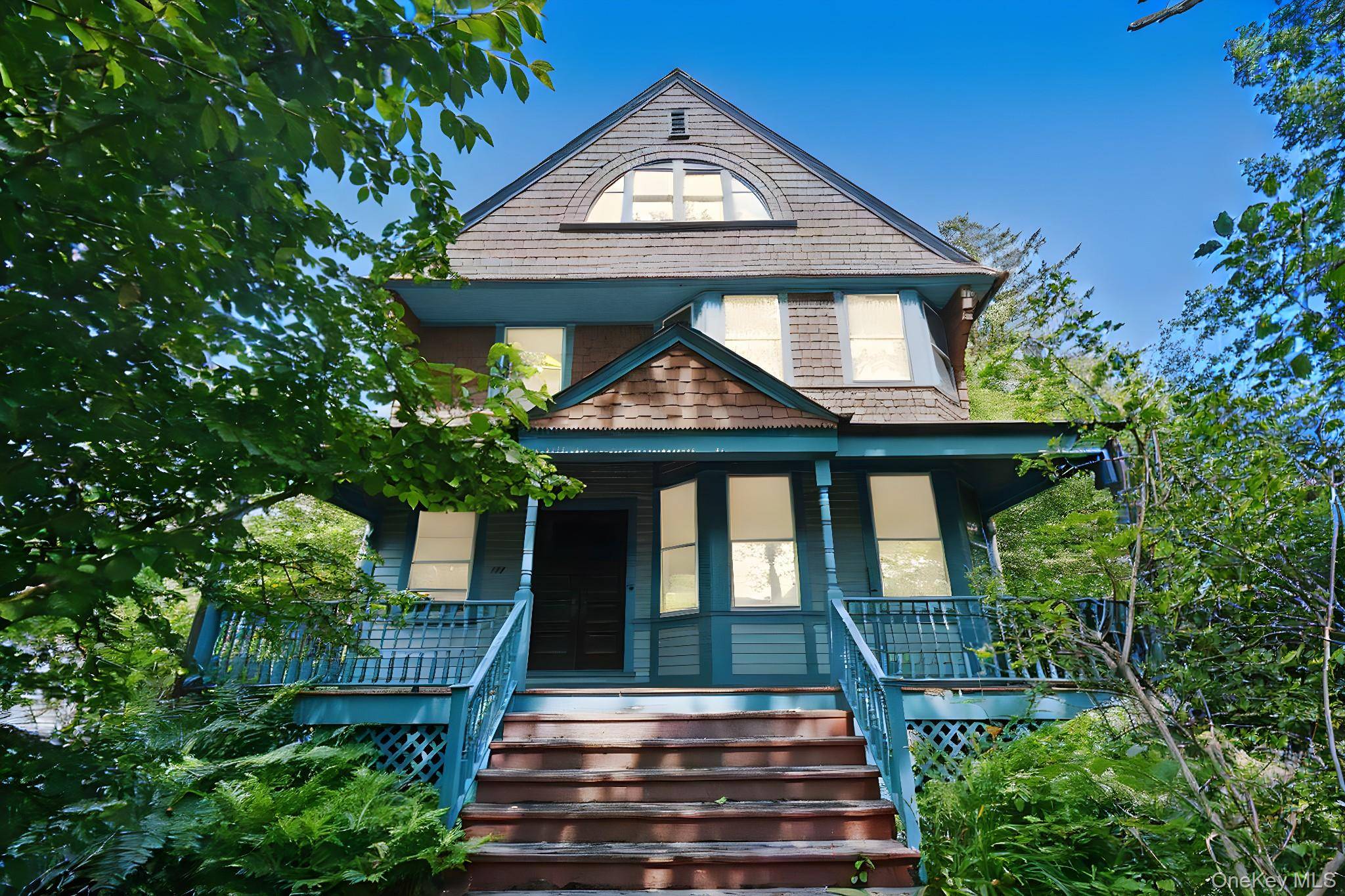 Grand Victorian home, featuring wonderful architectural details throughout, set on a large lot.