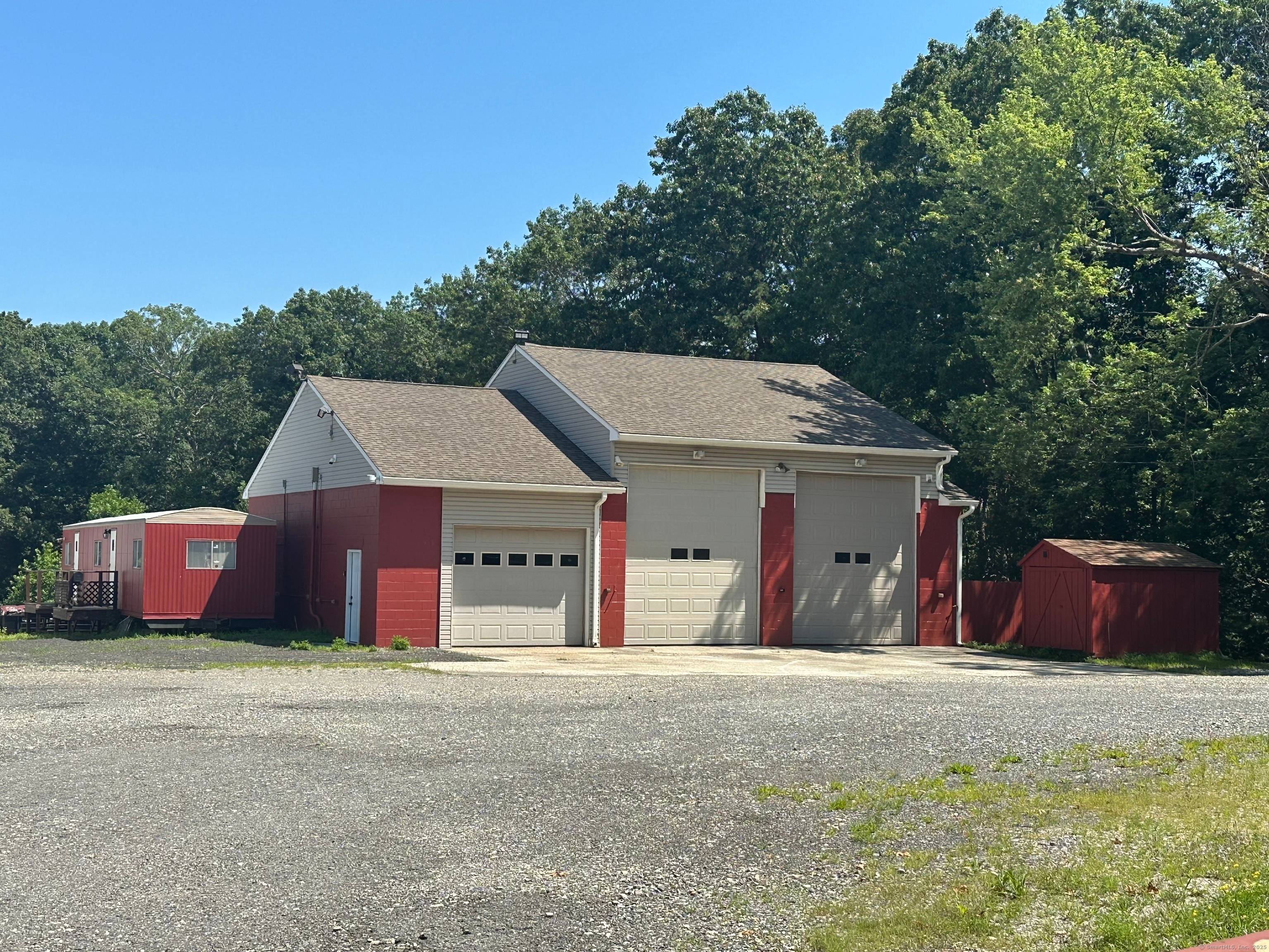 This spacious commercial building sits on over 3 acres of land, providing ample parking space and easy access for customers and employees.