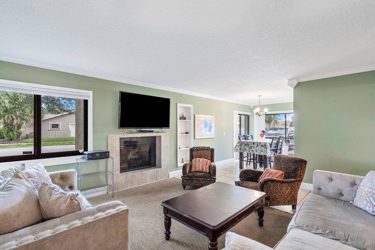 Move in ready and fully furnished, this spacious two bedroom, two bathroom condo offers comfortable, turnkey living in the heart of Wellington.