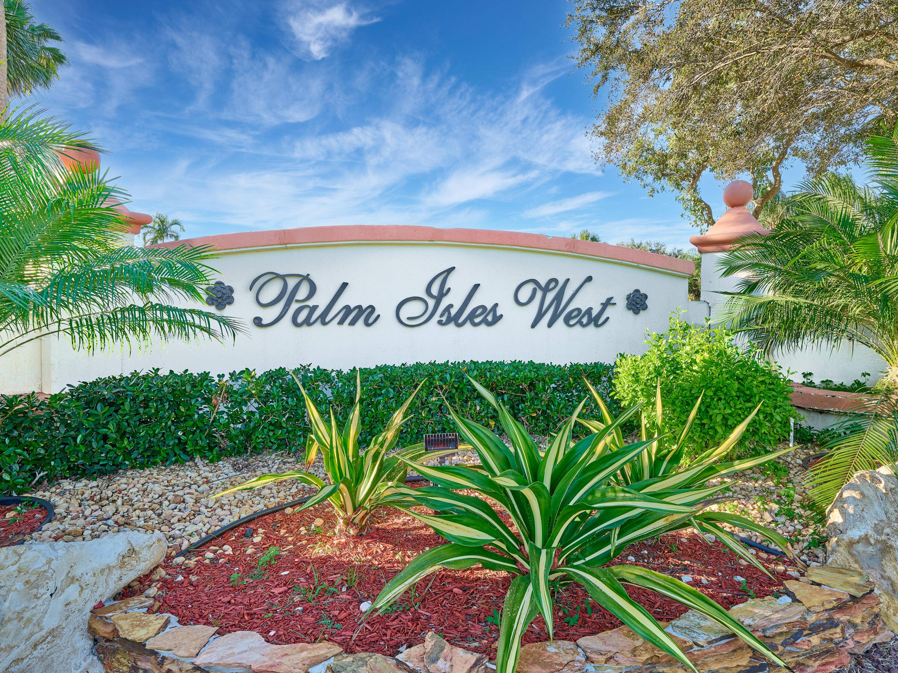 Welcome to this light filled 2 BR den, 2 BA villa w a 2 CG in the highly desirable 55 community of Palm Isles West.