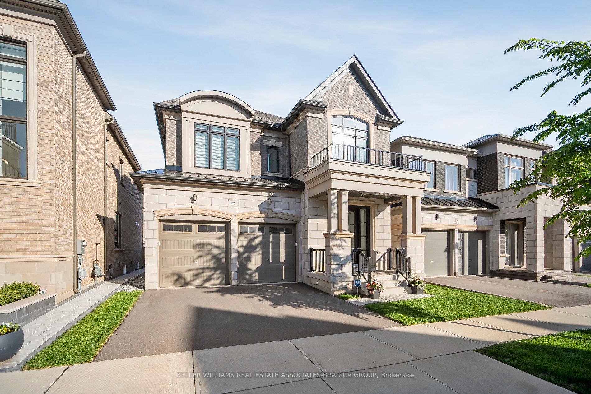Located on a quiet street near parks and trails, 46 Boulton Trail is a refined 4 bedroom, 5 bath detached home offering 3, 295 sq.