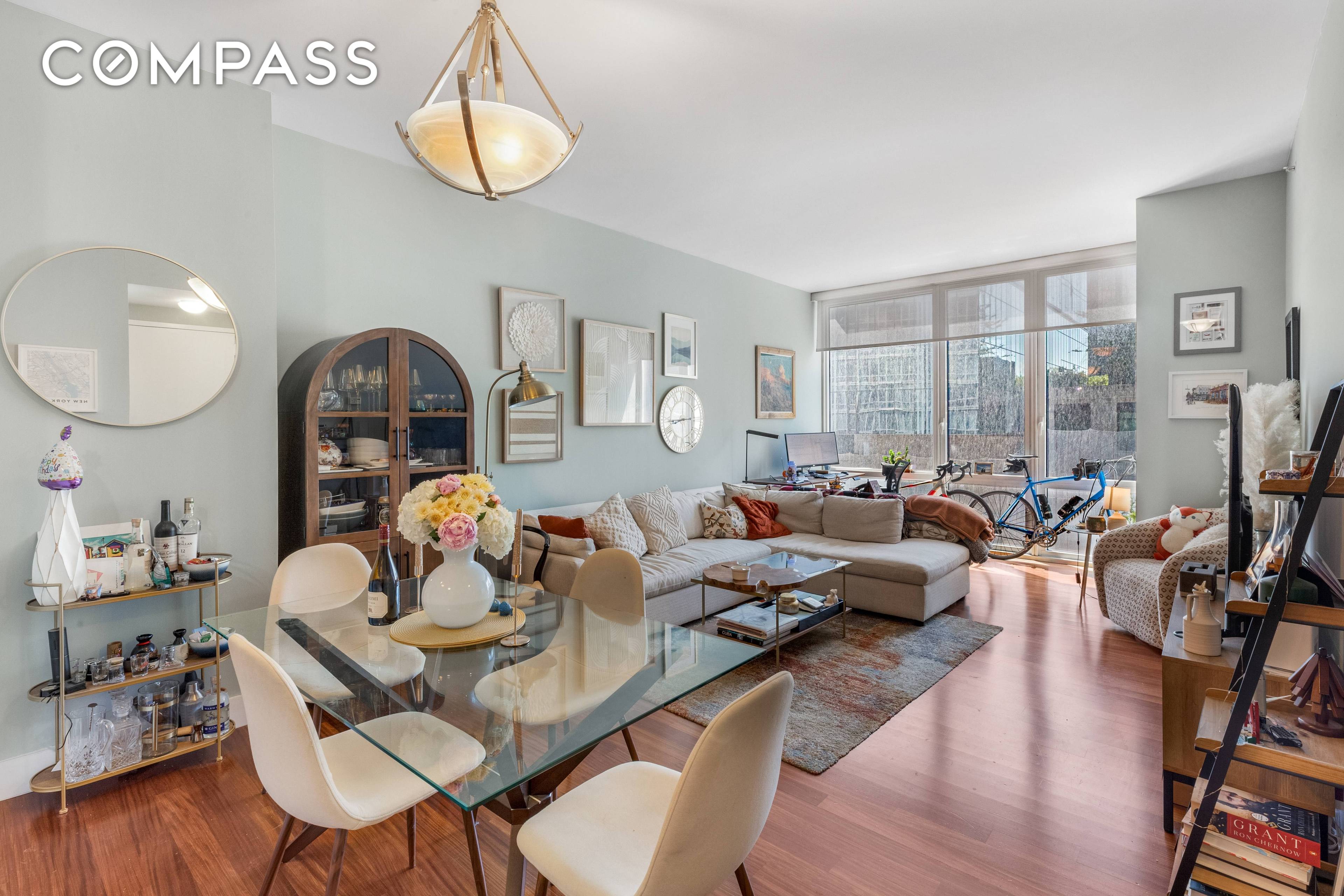 This oversized 1 bedroom, 1 bath residence at 10 West End Avenue boasts dramatic floor to ceiling windows and western exposure with Hudson River views and golden hour light.