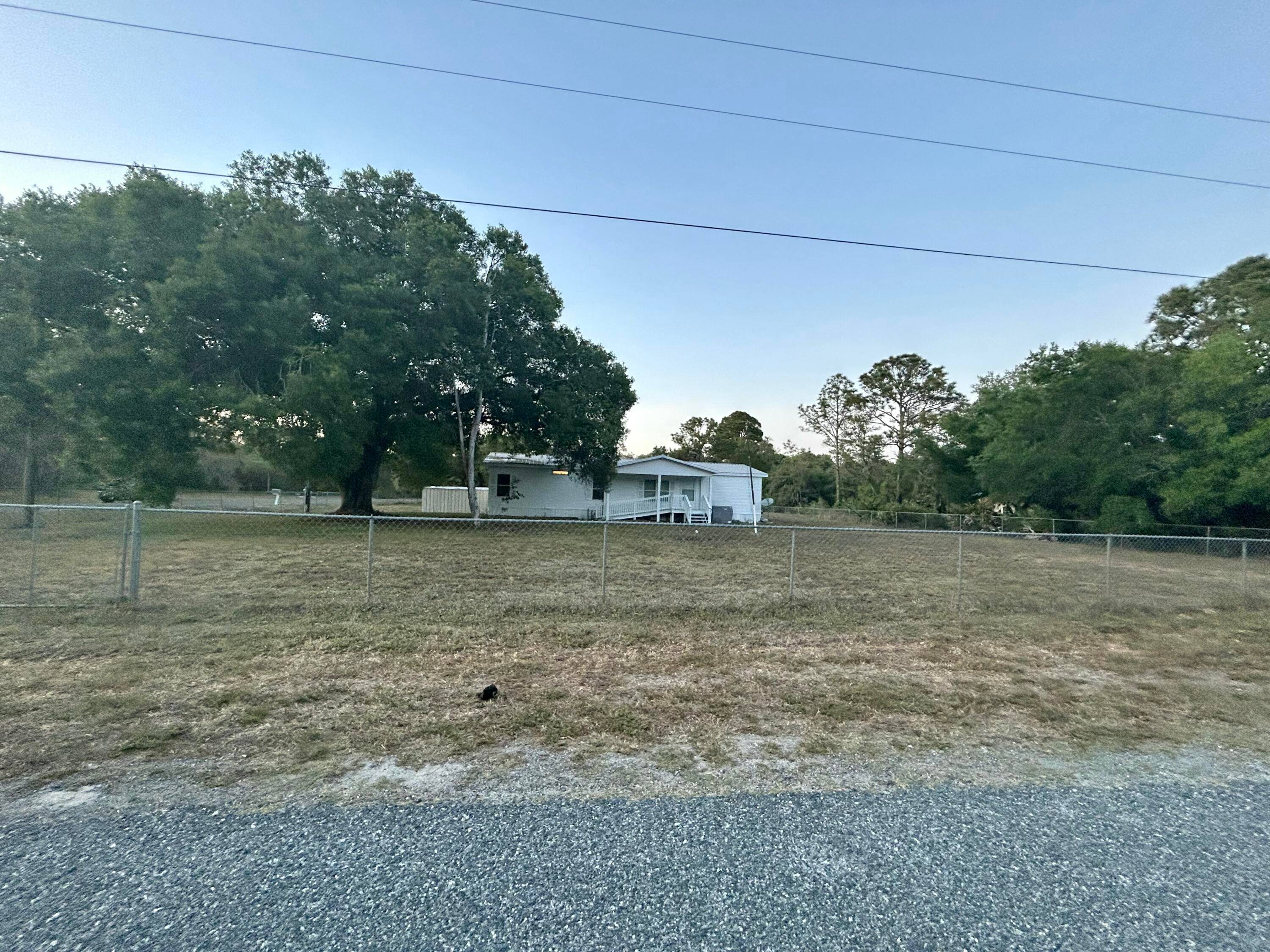 This generous home features three bedrooms and three bathrooms, along with an extra living area that can serve as a rental or a mother in law suite.