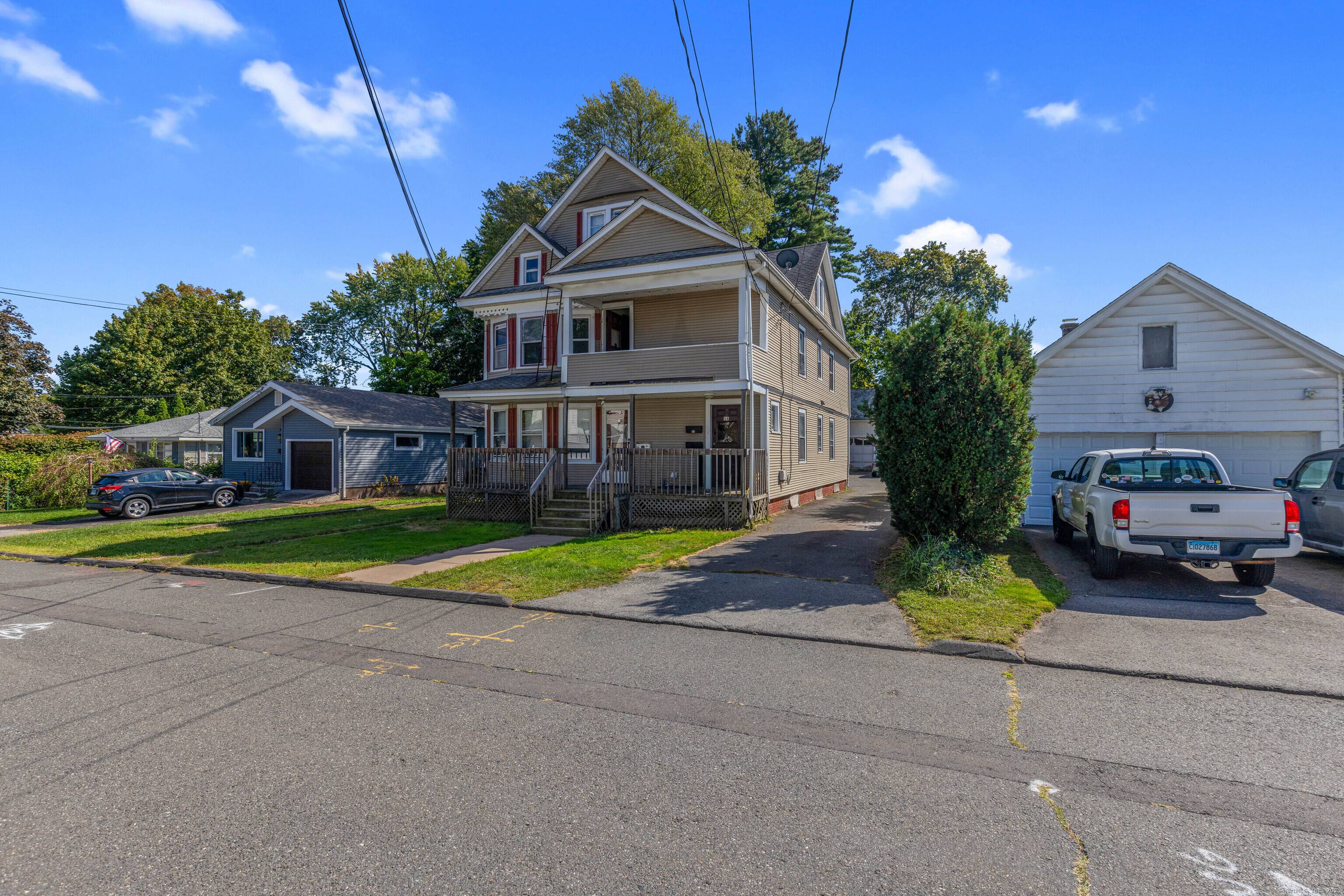 In search of a well maintained three family home in a tranquil setting ?