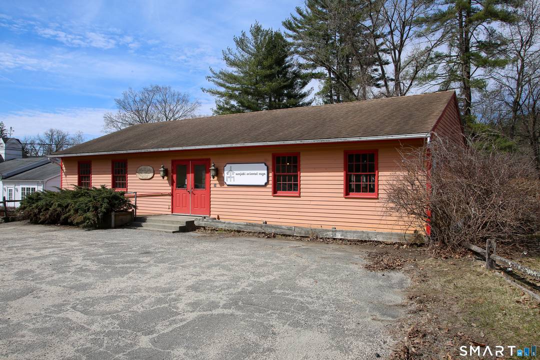 Commercial building with high visibility on US RTE 7 in Cornwall Bridge CT with over 6000 sq feet of retail space and plenty of parking.