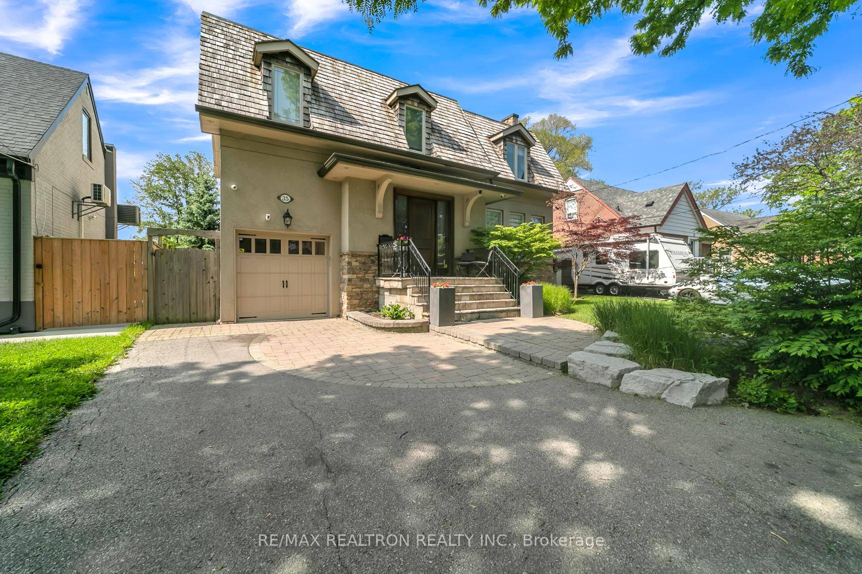 Absolutely gorgeous, bright, quiet, family oriented neighbourhood, surrounded by parks, trails, and green space near the Humber River.