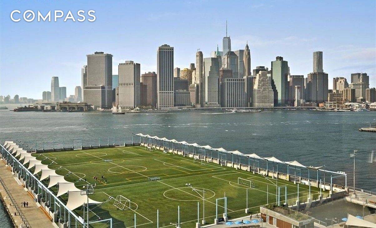 STUNNING VIEWS from this spectacular 2 Bedroom 2 bath 1, 430 s f designer condo Loft.