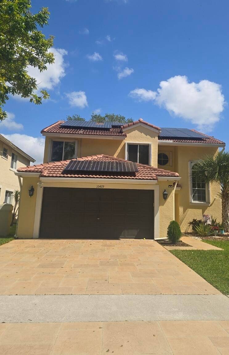Offering spacious 4 2. 5 with sparkling lake view house in desirable Boca Springs.
