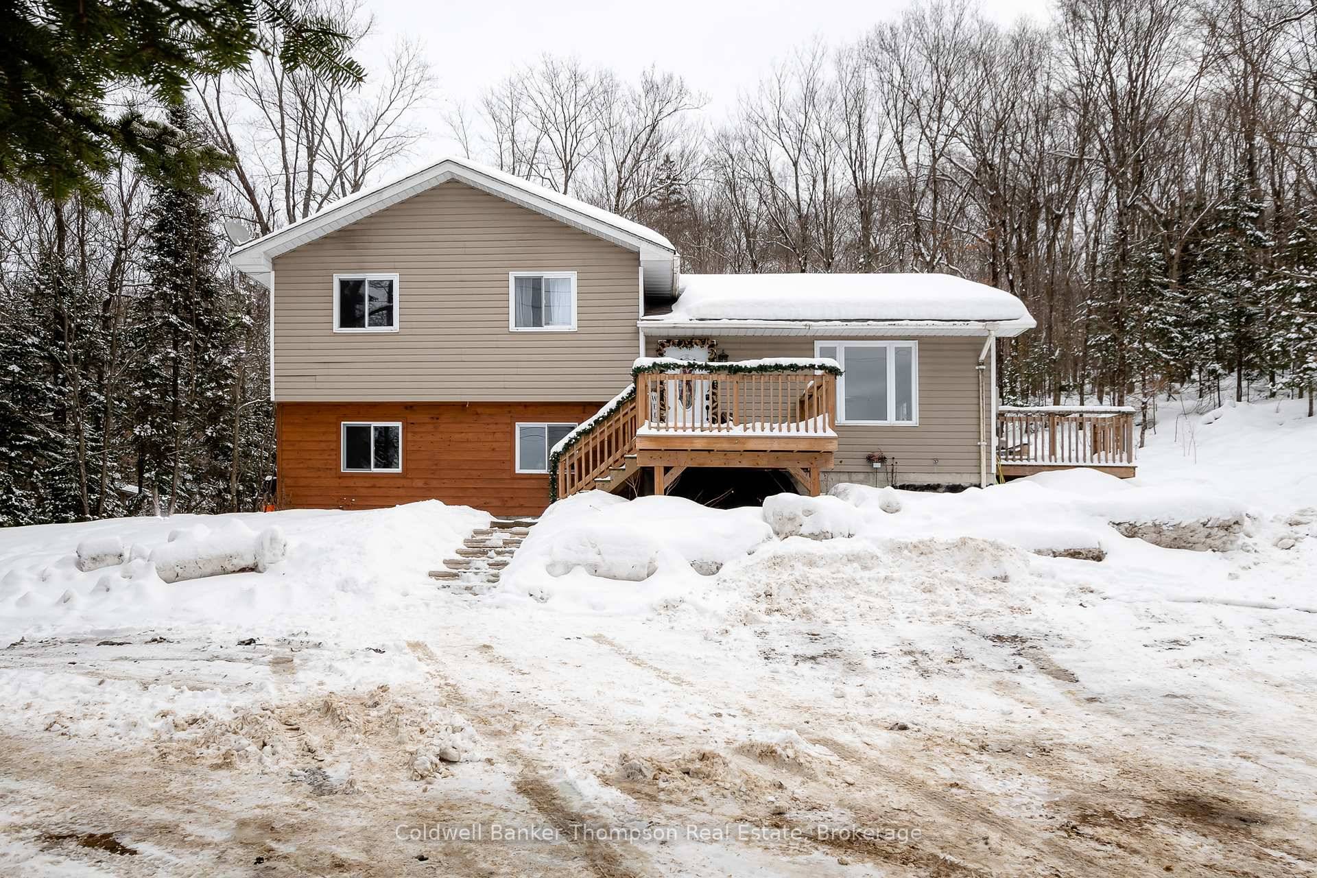 This inviting three bedroom side split, built in 2005, sits on nearly 2 acres of peaceful rural countryside and offers a blend of charm and potential.