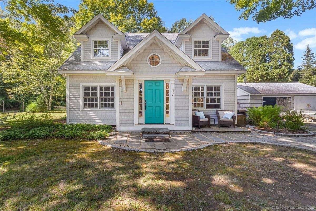 Charming Cape Cod home offering desirable first floor living, nestled on a scenic, spacious, and private lot in scenic Deep River.
