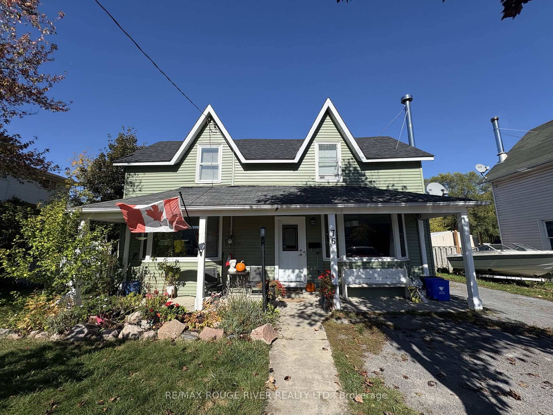 This recently renovated two story century home seamlessly combines modern flare with timeless character.