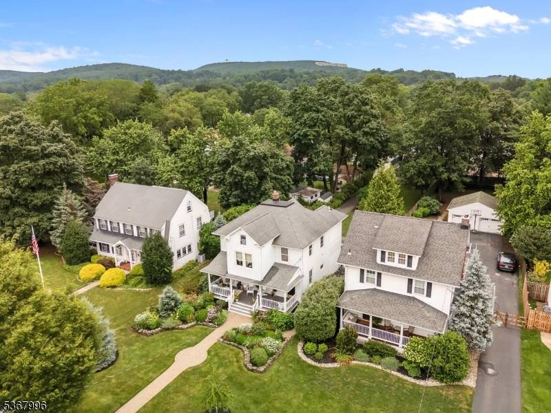 Beautifully updated home blending timeless charm with modern comforts, just steps from the train station, walking trails outdoor concerts.