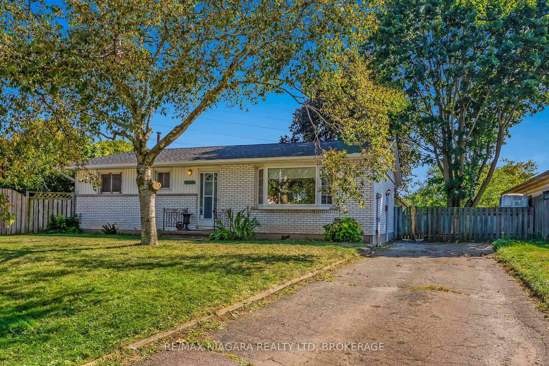 Welcome to 5858 Carman Street, a beautifully updated bungalow in Niagara Falls sought after north end.