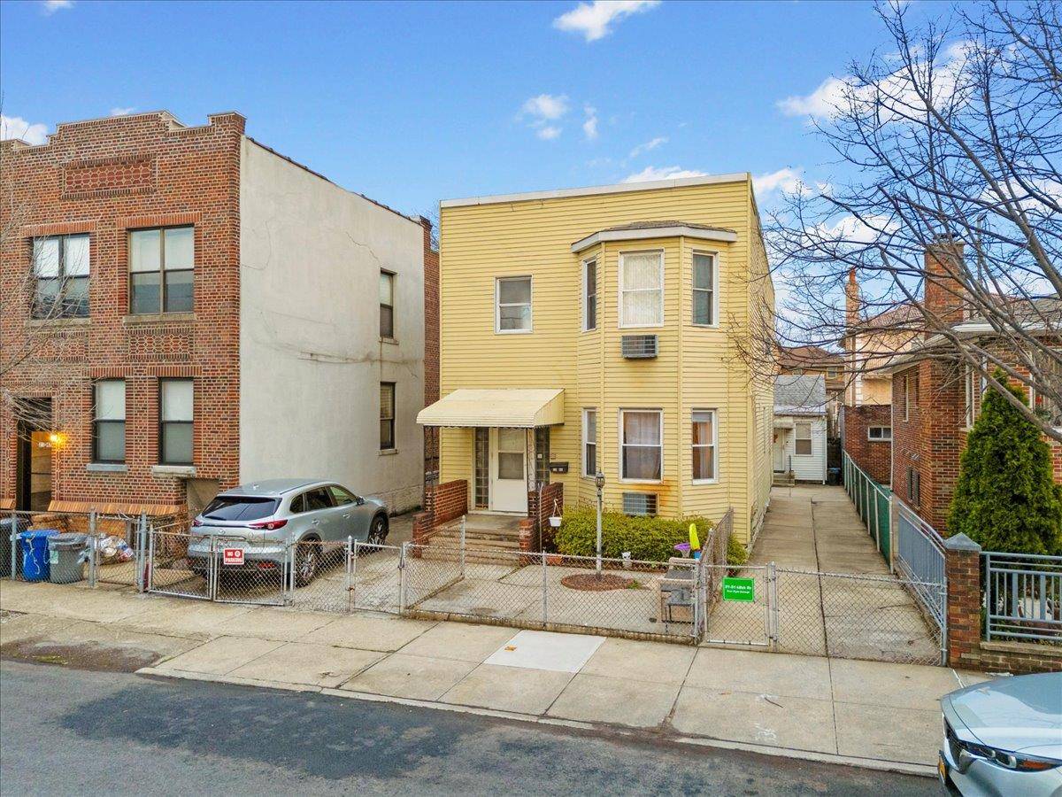 TWO HOUSES ON A 40 BY 100 LOT !
