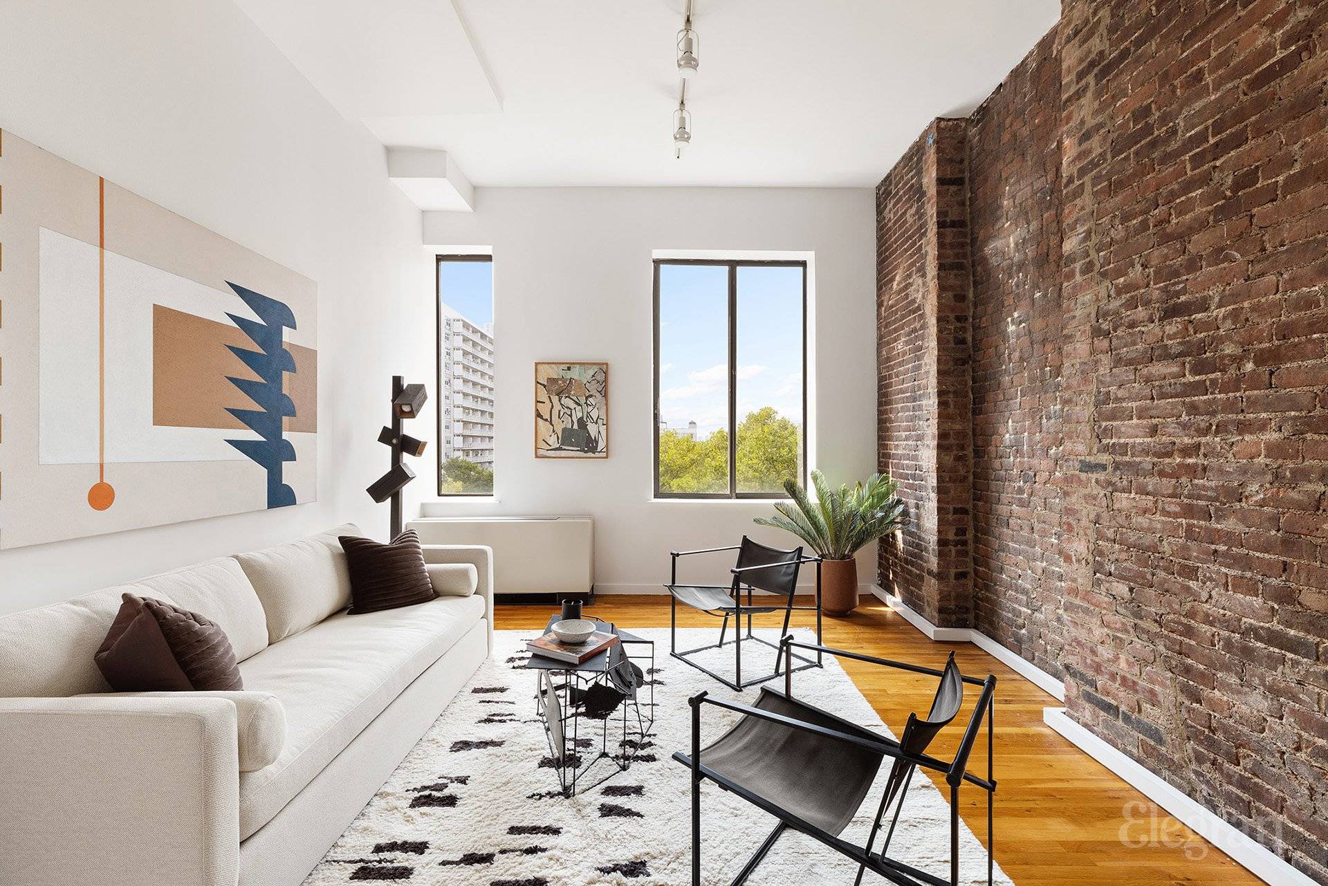 Apt 802 is an immaculately renovated Greenwich Village loft that welcomes you in with 11 ceilings, hardwood floors, and exposed brick throughout.