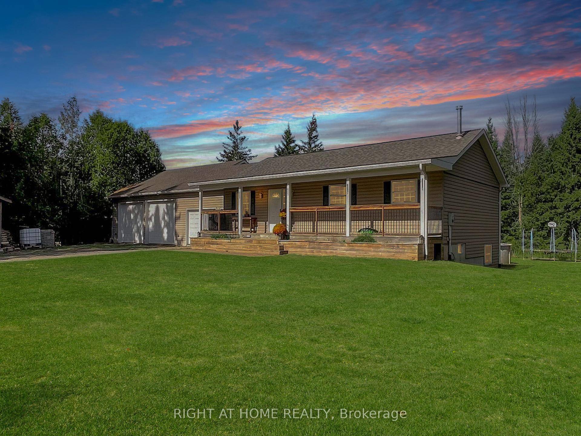 Nestled on a half acre, mature lot wired for an invisible fence with no neighbours behind, this picturesque property offers a serene country setting, perfect for those seeking peace, privacy, ...