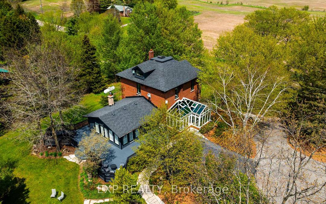 Perched atop a rolling hill on nearly 4 acres in the heart of Mono, this extraordinary country property blends timeless character with thoughtful modern updates just minutes from Orangeville.