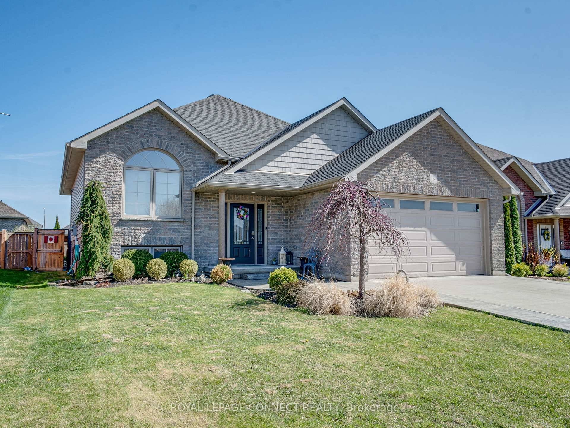 This beautifully landscaped raised bungalow offers an open concept design in the sought after Woodway Trail subdivision.