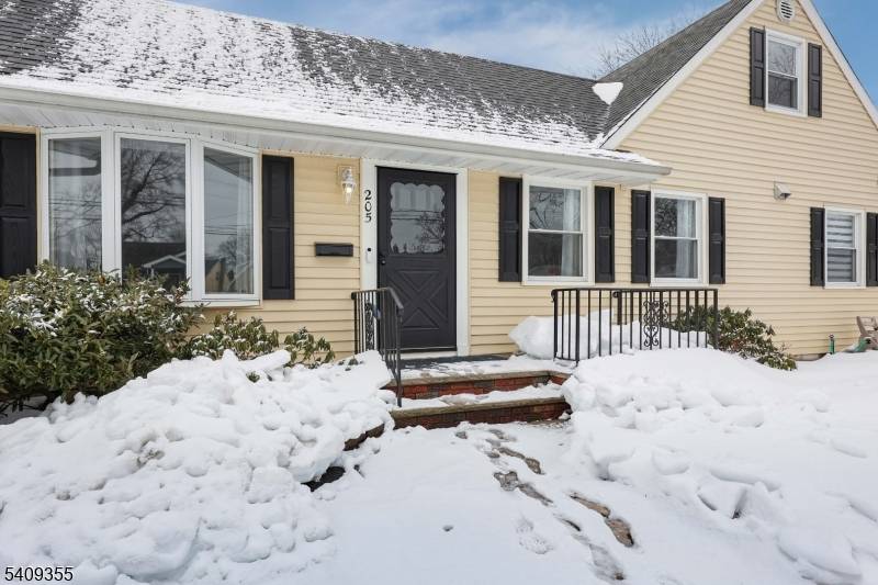 Absolutely beautiful sun filled expanded cape situated on a wonderful street in the desirable town of Clark !