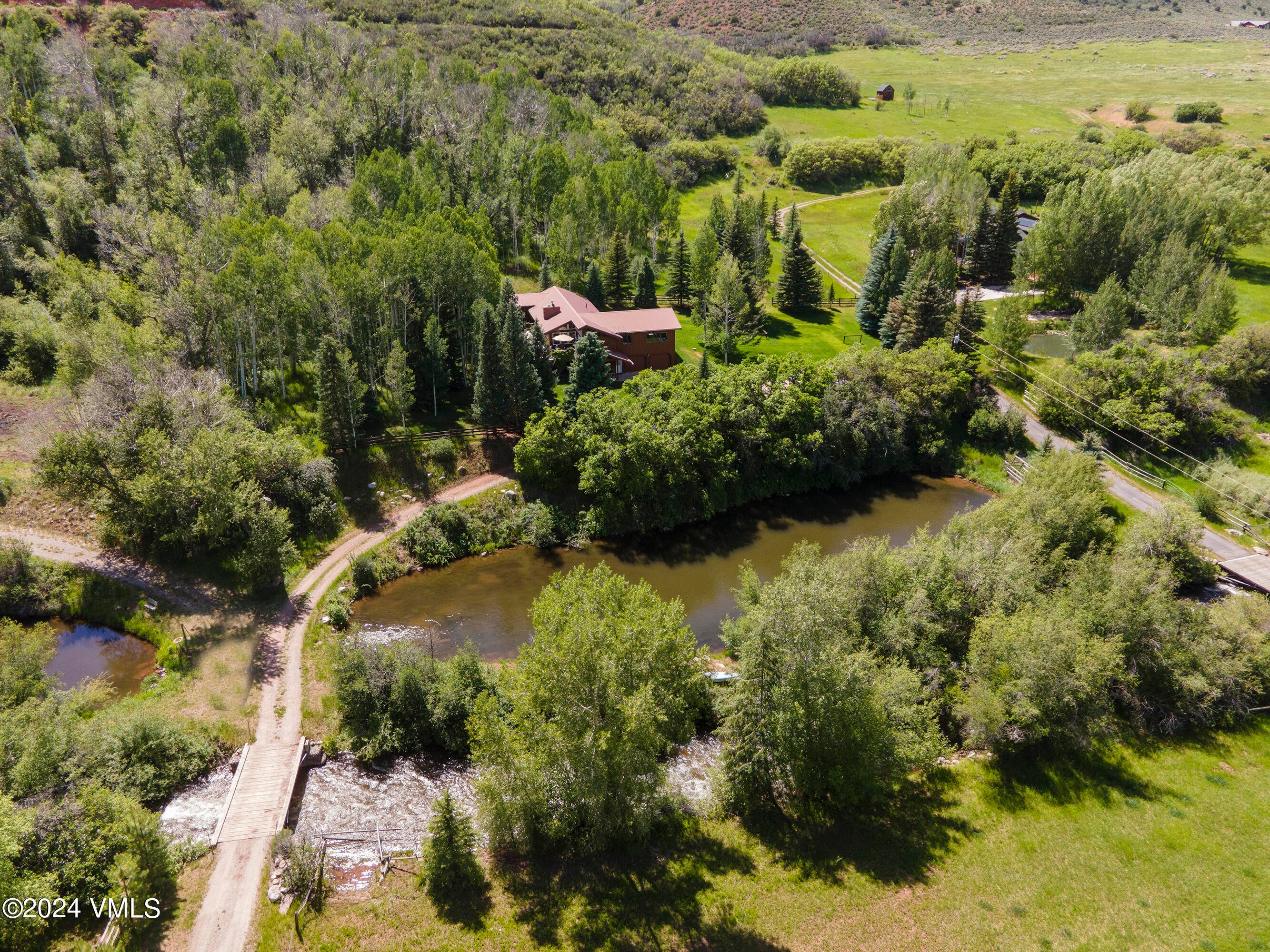 Nestled on over 5 acres with Brush Creek running through, this charming 3 bedroom, 3 bathroom home, with office, family room and game room, offers a blend of natural beauty ...