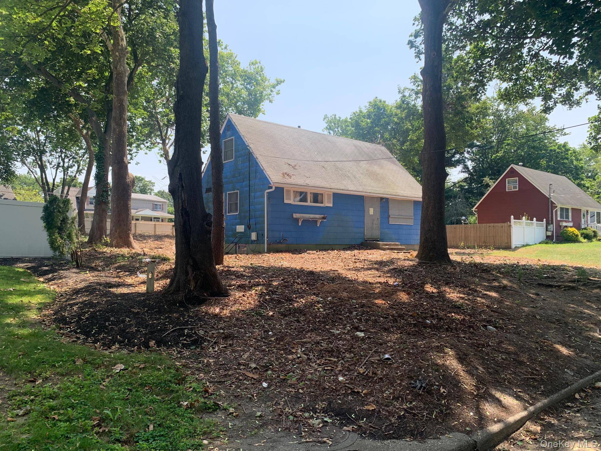 Investor Delight. 4 BRs 1 Bath Cape w Large Fenced Yard on Quiet Street.