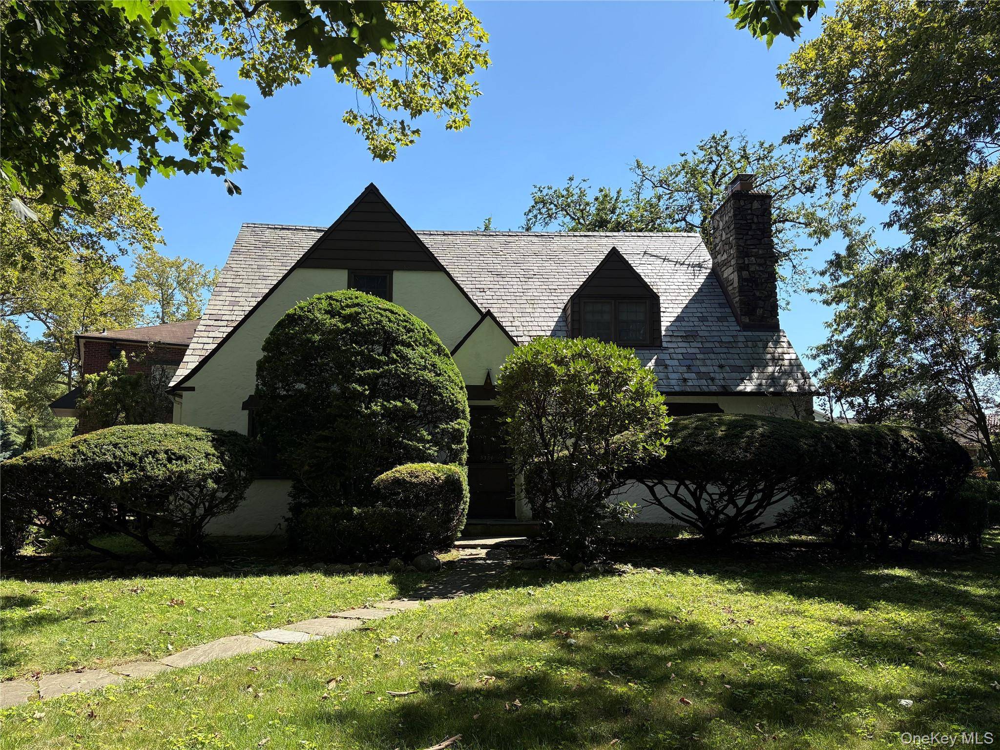 Timeless English Tudor In The Heart of Little Neck Hills.
