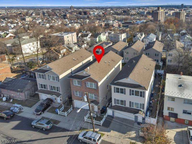 Welcome to this beautiful two family home, offering versatile bonus spaces and exceptional comfort.