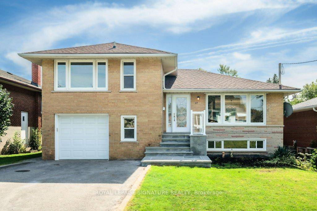 Beautiful Renovated Sidesplit with Open Concept Design on the Main Floor.