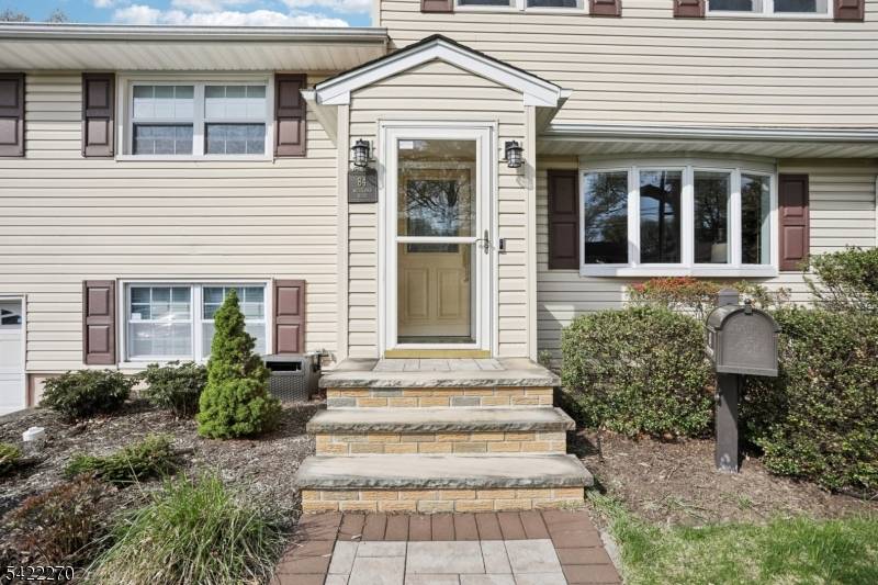 Welcome to one of the most expansive split level homes on one of Cedar Grove's most sought after streets where space, comfort, and everyday living come together beautifully.