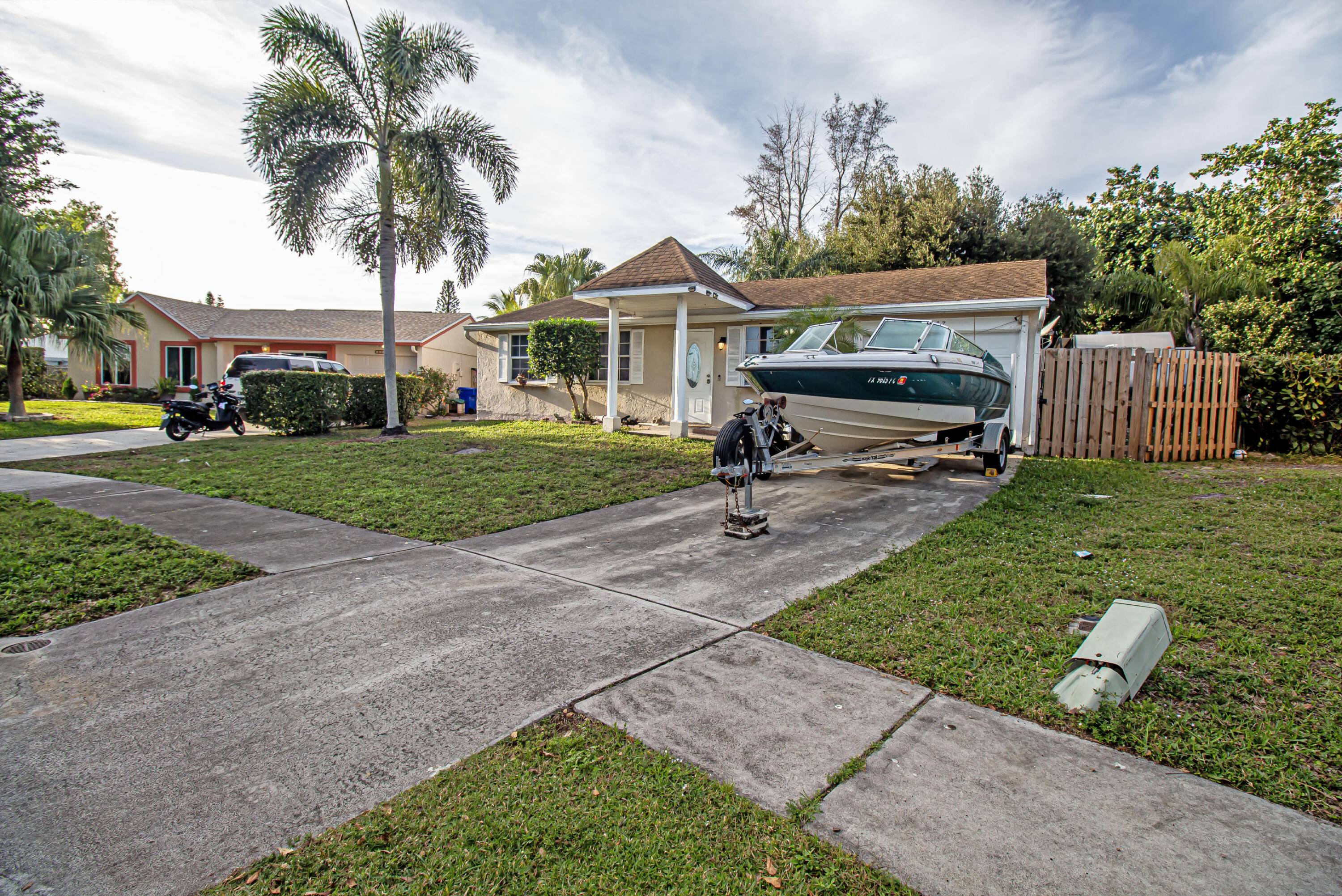 Discover this incredible home, beautifully remodeled with high quality laminated wood gray flooring, Walk in closet space to build a bathroom.