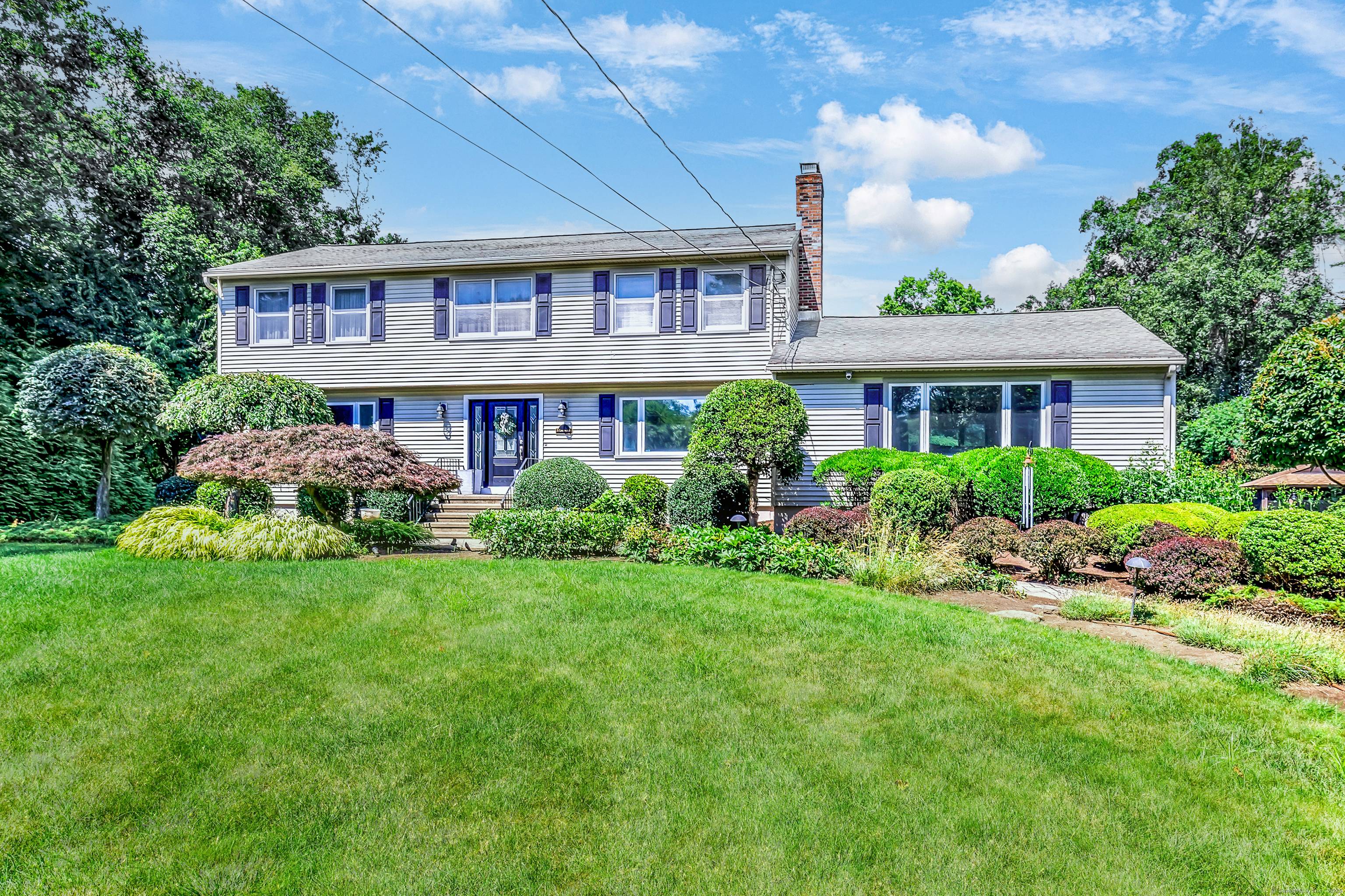 This Gorgeous Colonial awaits you at the end of a quiet cul de sac !