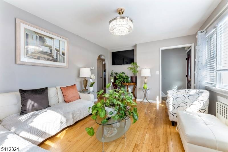 Welcome to this charming 4 bedroom, 2 bath home nestled on a beautiful property in desirable Totowa.