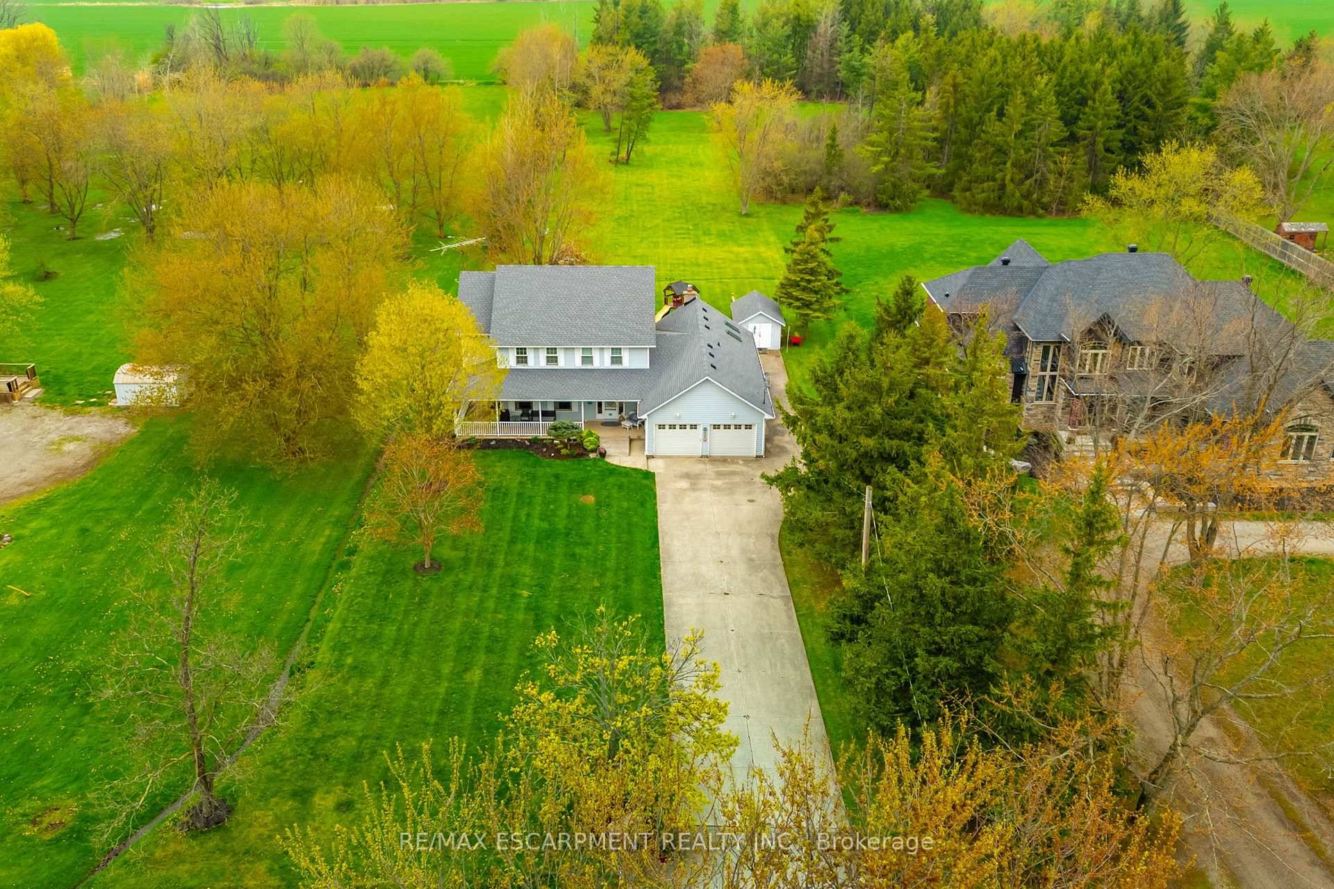 Welcome to this picturesque country retreat, nestled on a tranquil 1 acre lot surrounded by mature trees on the desirable Grimsby mountain.