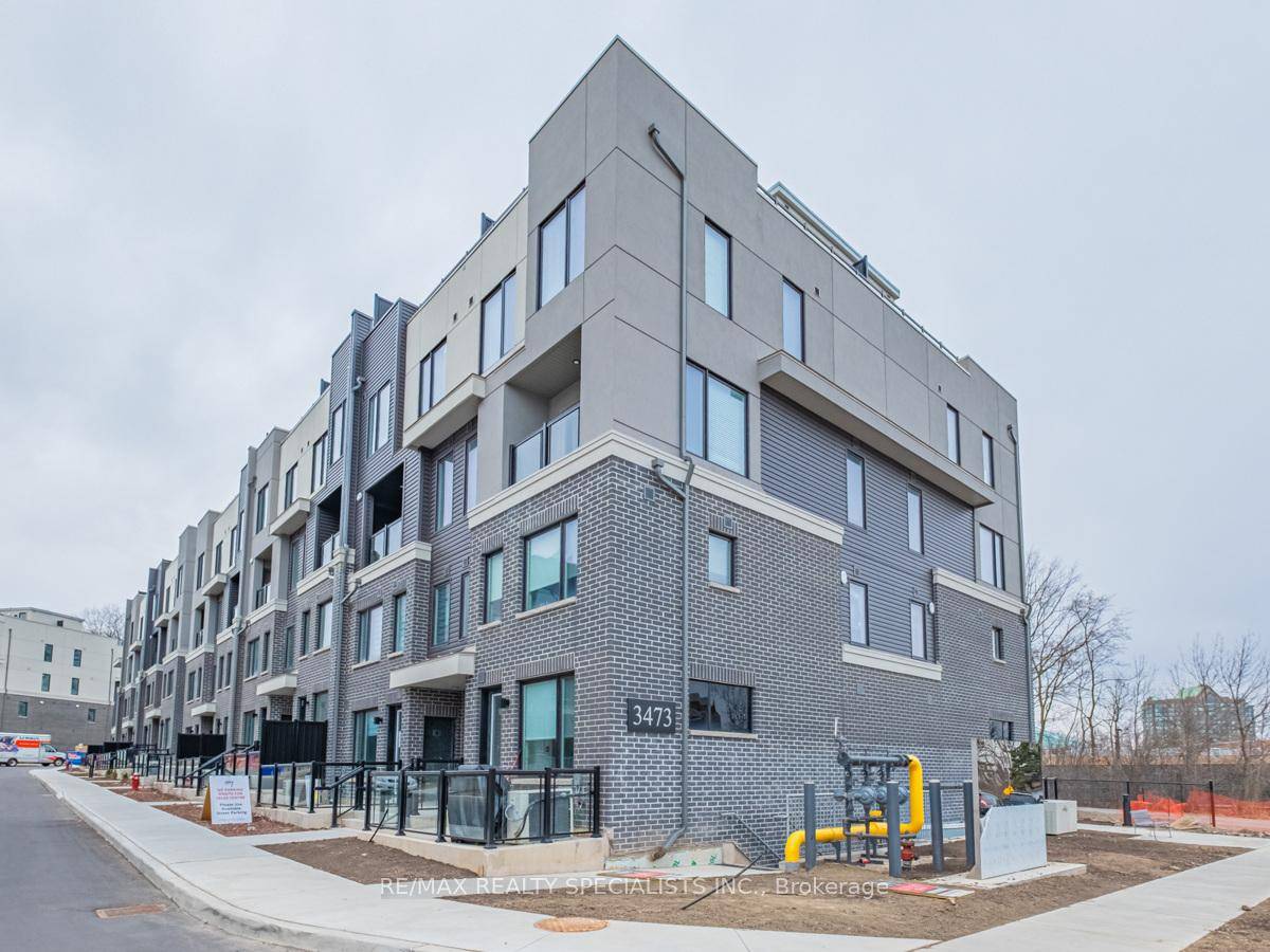 Lovely Corner Unit Townhouse With Custom Builder Upgrades !