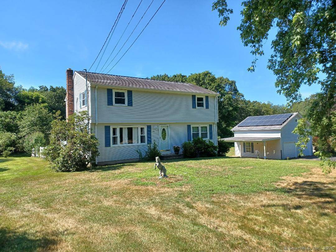 Plenty of room to stretch out and enjoy both inside and outside of this 4 Br, 2 Ba Colonial sitting on 2.