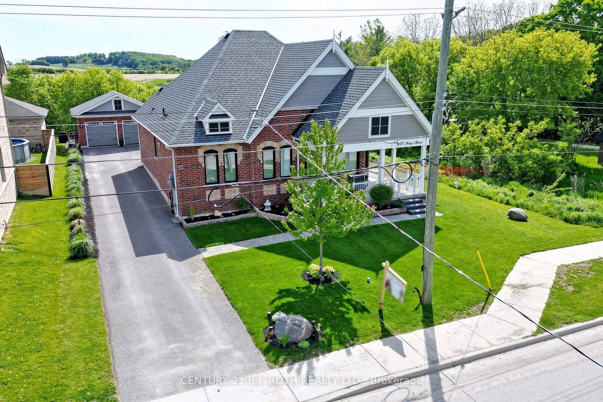 Welcome to 157 Mary St., Creemore a charming all brick bungalow on a private corner lot backing onto open fields with no side neighbours.