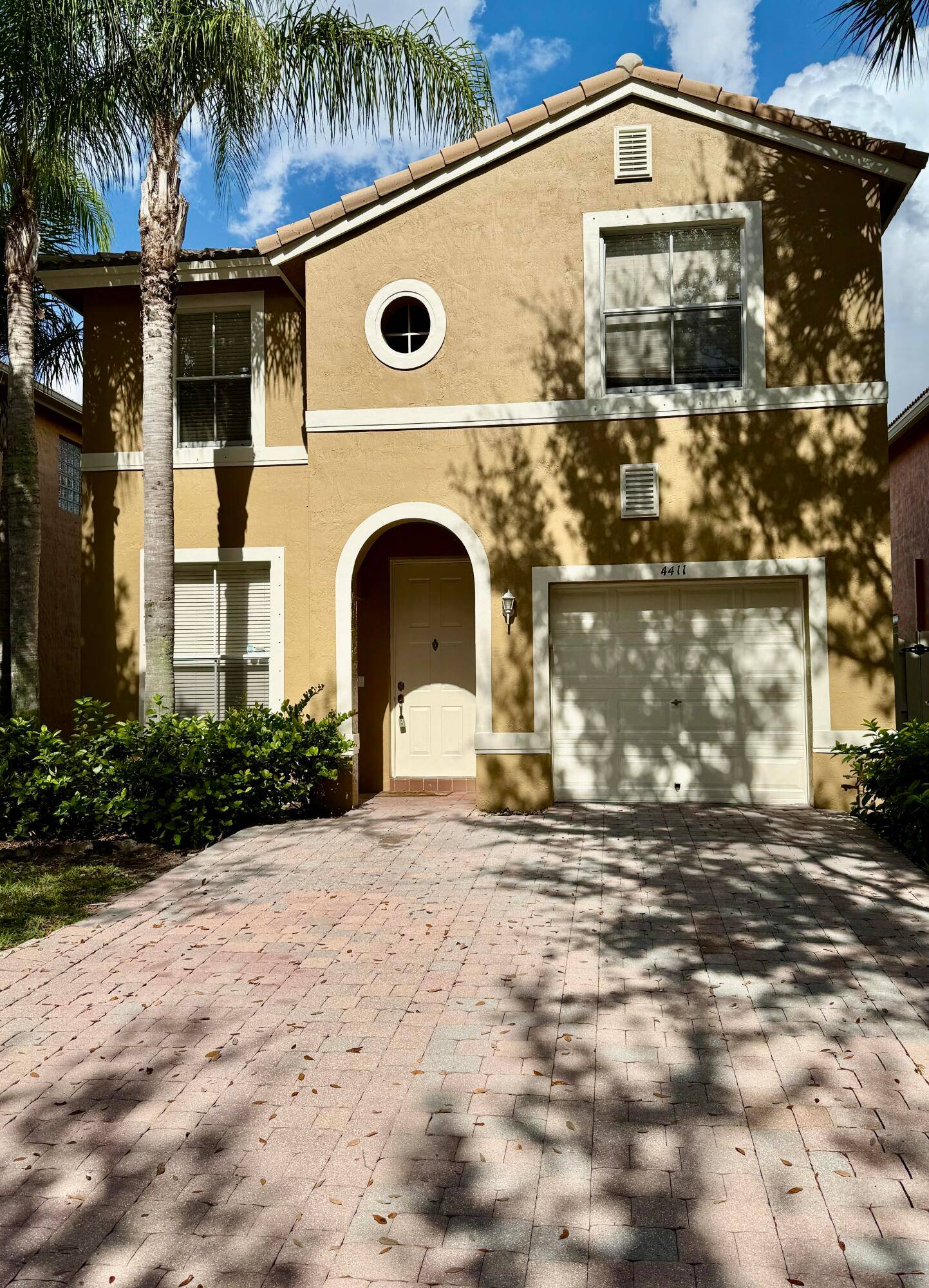 Nestled in the highly desirable Lakes of Laguna gated community in West Palm Beach, this freshly painted inside and out !