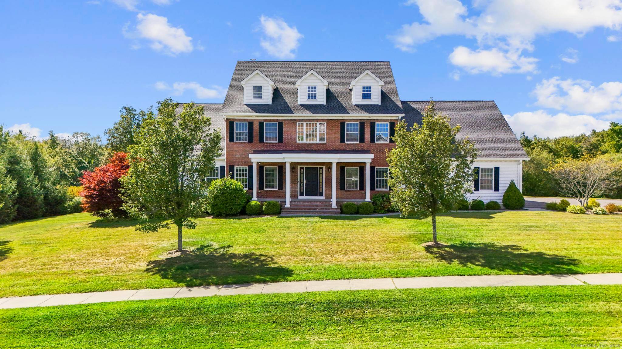 Stately Colonial with Grand New England Charm !