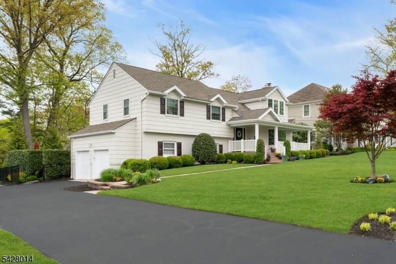 Beautifully renovated and situated on one of Westfield's most recognizable streets, this inviting home offers a perfect blend of space, comfort style.
