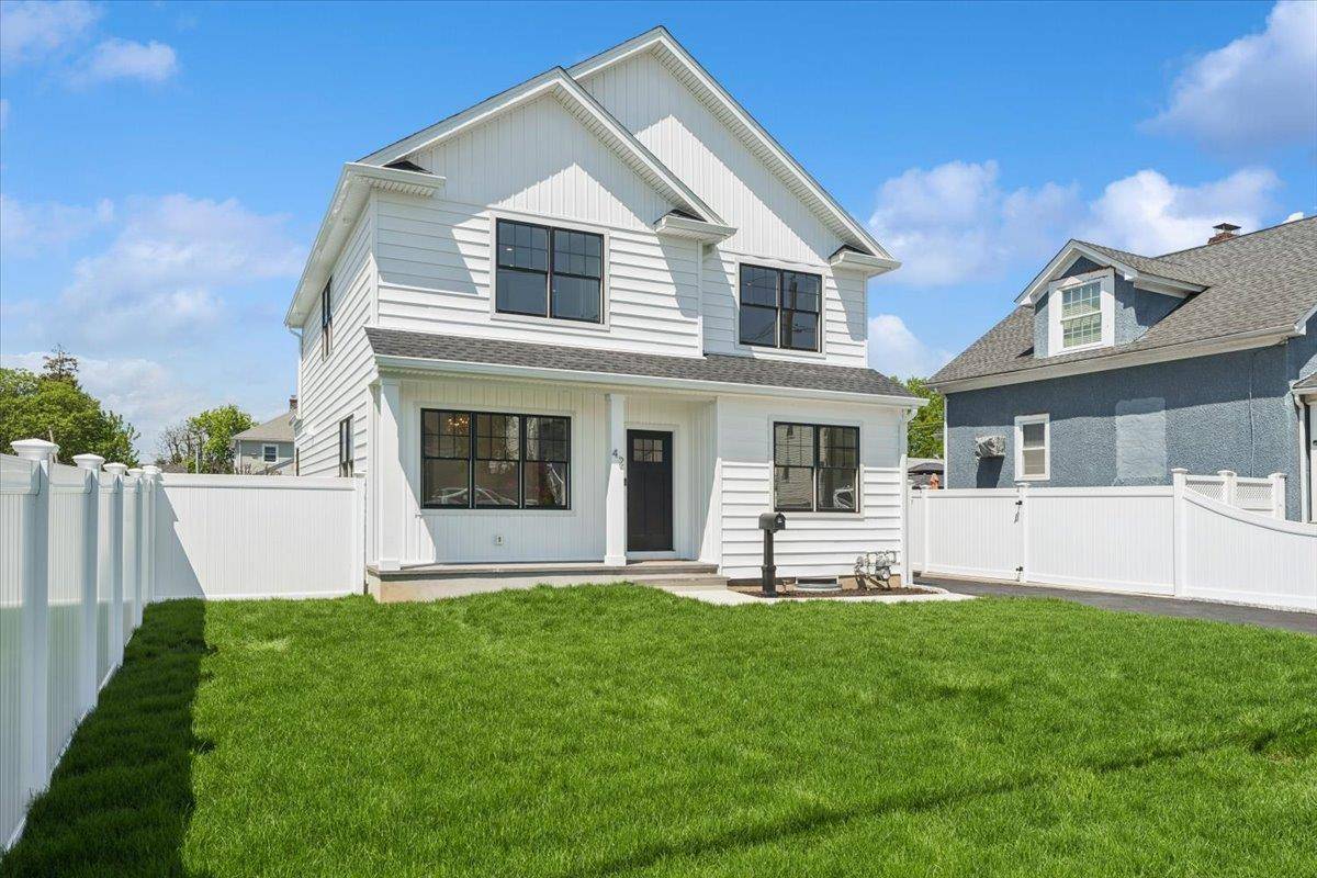 Experience elevated living in this stunning new construction home located at 42 Second Street in the heart of Glen Cove.