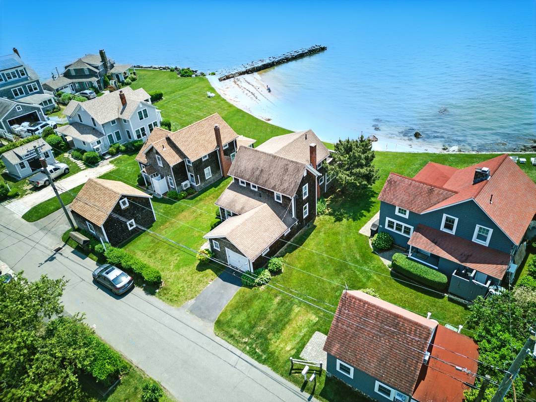 Spectacular Waterfront Home on Long Island Sound Step into a world of timeless elegance at this beautifully updated waterfront cottage, where classic New England charm meets modern comfort.