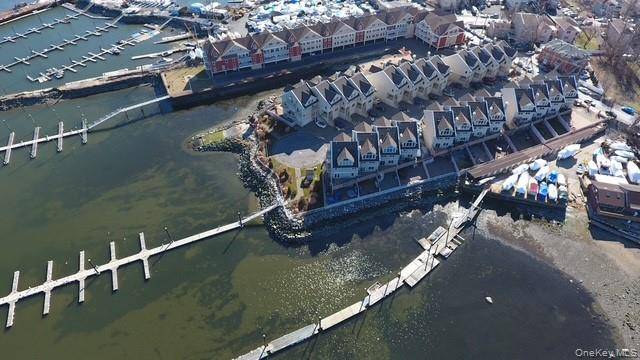 Welcome to this stunning two family home located in a serene waterfront private gated community, in the Country Club section of Bronx.